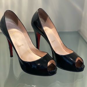 Louboutin patent leather pumps